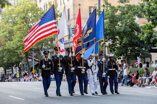 The Joint Service Color Guard walks the Seafair Torchlight Parade in Seattle, Washington, on July 30, 2016.